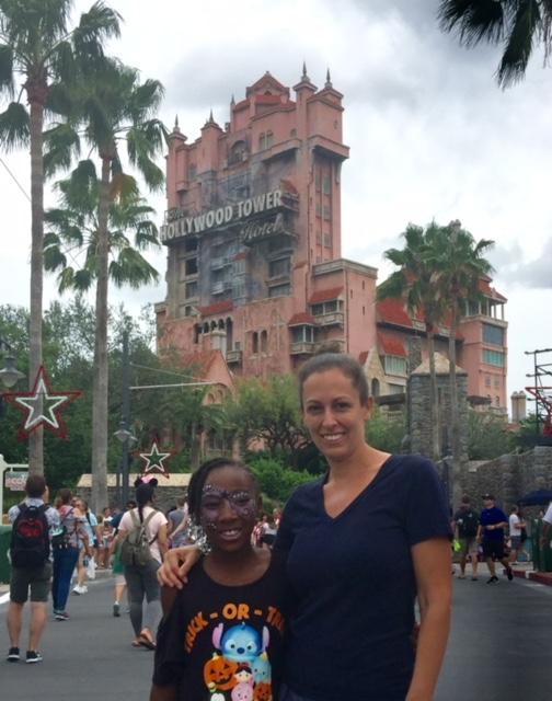 Child and mother in front of tower of terror- tier 1 fast pass choice for Hollywood studios