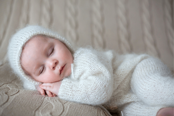 vintage baby girl in crochet outfit