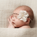 Elegant girl with flower headband sleeping